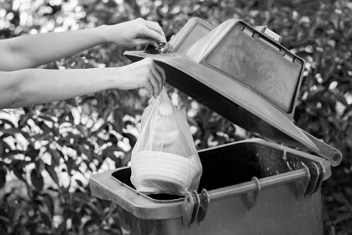 Community members participating in recycling programs